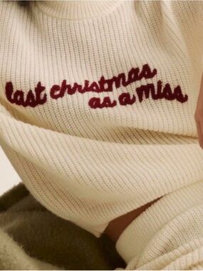 Six stories embroidered last Christmas as a miss knit sweater